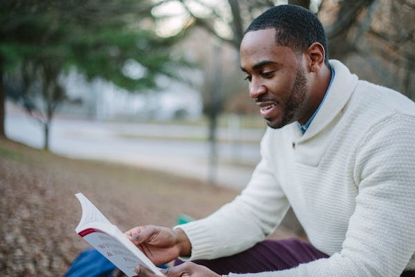 a man reading a book