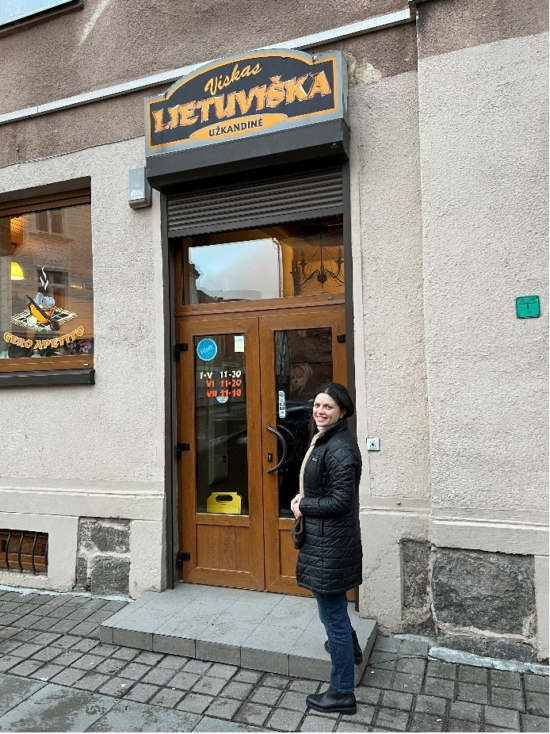 Irina Bukatik standing outside a restaurant in Klaipeda.