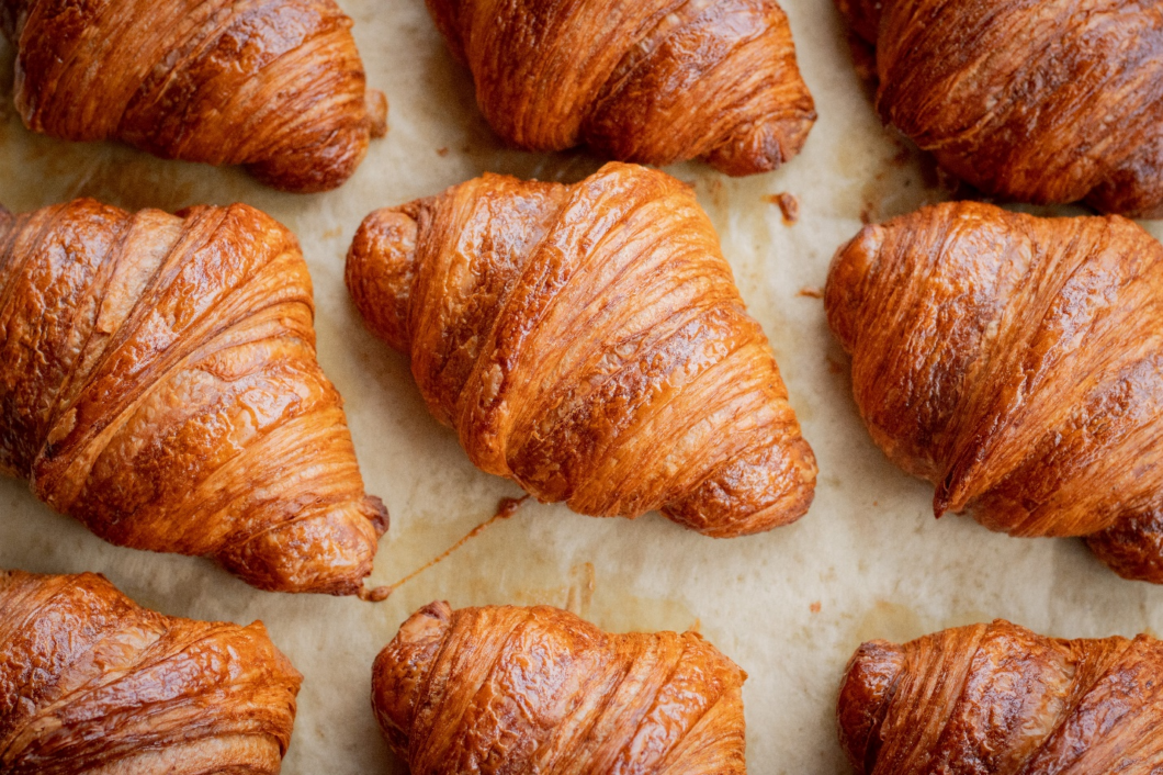 croissants lining a table