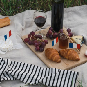 An image of a food platter with wine in France